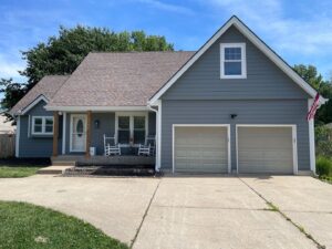 Lee's Summit home with newly installed siding & gutters