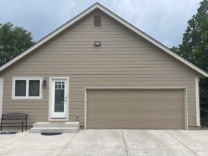 Exterior remodel on Overland Park home with khaki James Hardie Siding